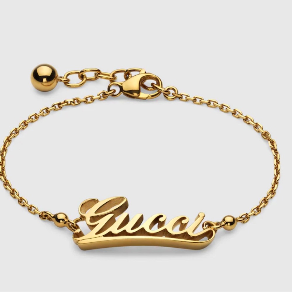 CHAIN BRACELET WITH GUCCI SCRIPT
 gold